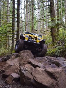 Preview wallpaper salem jeeper, jeeper, suv, car, stones, forest