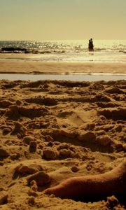 Preview wallpaper sand, coast, beach, feet, tattoo, pair, rest