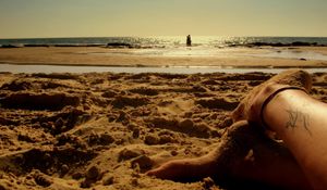 Preview wallpaper sand, coast, beach, feet, tattoo, pair, rest