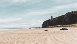 Preview wallpaper sand, coast, mountain, landscape