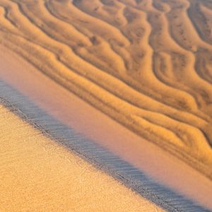 Preview wallpaper sand, coast, sandy, water