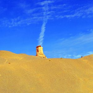 Preview wallpaper sand, desert, dunes, ruins, sky