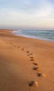 Preview wallpaper sand, footprints, coast, sea