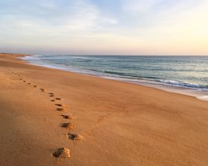 Preview wallpaper sand, footprints, coast, sea