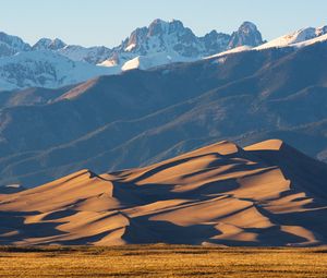 Preview wallpaper sand, mountains, hills, snowy, slope