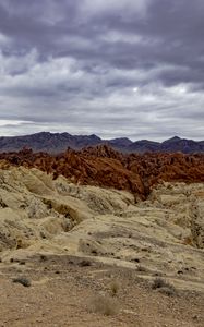 Preview wallpaper sand, mountains, stones, clouds, dark, nature