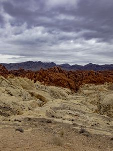 Preview wallpaper sand, mountains, stones, clouds, dark, nature