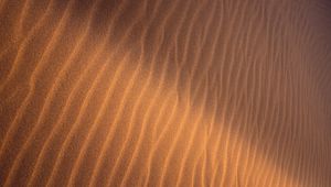 Preview wallpaper sand, ripples, waves, texture, surface, brown