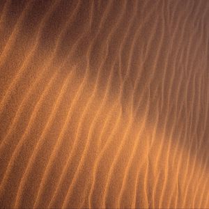Preview wallpaper sand, ripples, waves, texture, surface, brown
