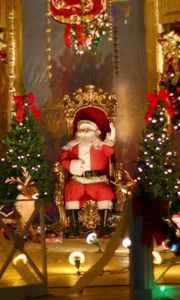 Preview wallpaper santa claus, chair, bears, toys, gifts, fencing, trees, ornaments, christmas