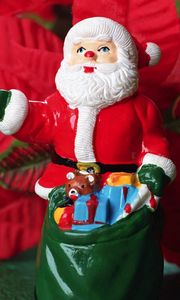 Preview wallpaper santa claus, christmas, toy, sack, flowers