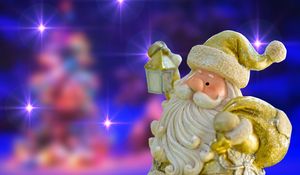 Preview wallpaper santa claus, figurine, toy, new year, christmas, shine