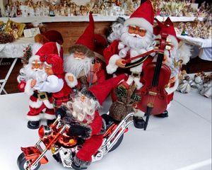 Preview wallpaper santa claus, holiday, christmas, toys, bike