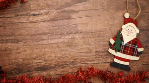 Preview wallpaper santa claus, wood, tinsel, new year, christmas