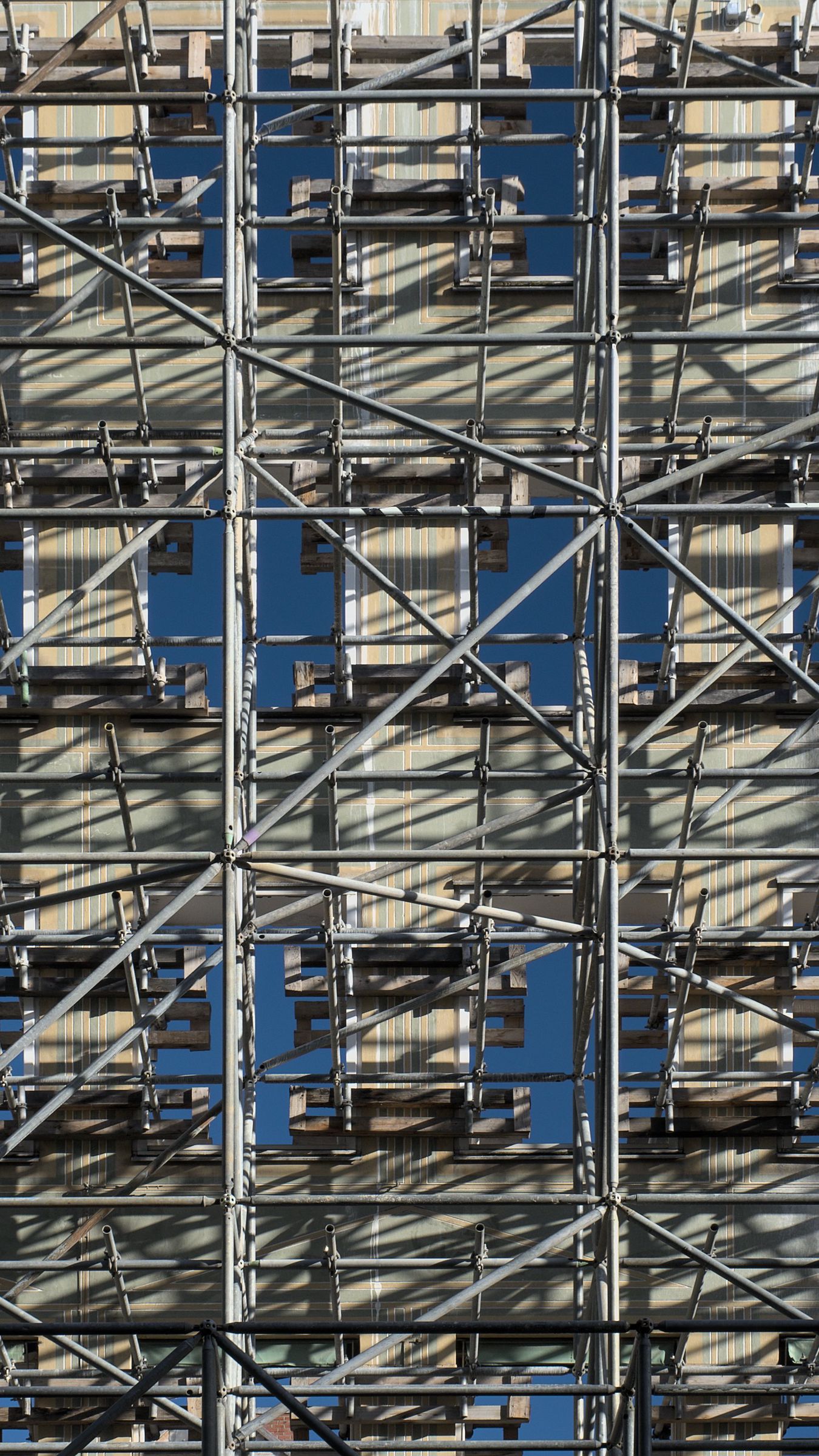 Download wallpaper 1350x2400 scaffolding, construction, building, metal