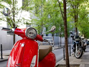 Preview wallpaper scooter, bike, red, parking, road