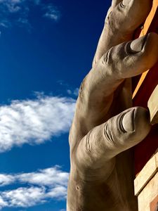 Preview wallpaper sculpture, hand, fingers, sky