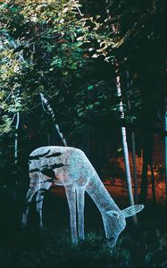 Preview wallpaper sculpture, light, trees, deer, art