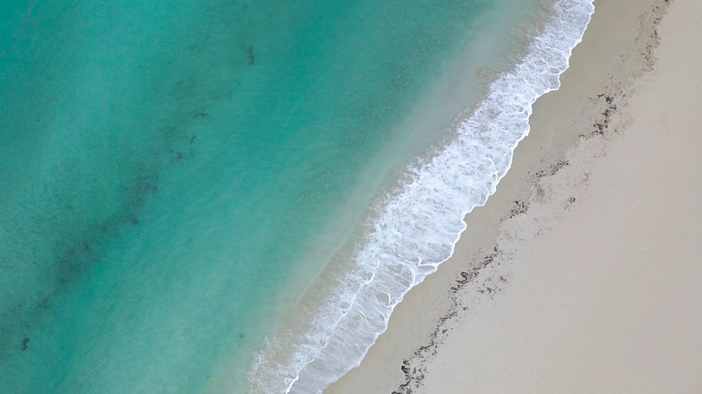 Download wallpaper 1366x768 sea, aerial view, coast, sand tablet ...