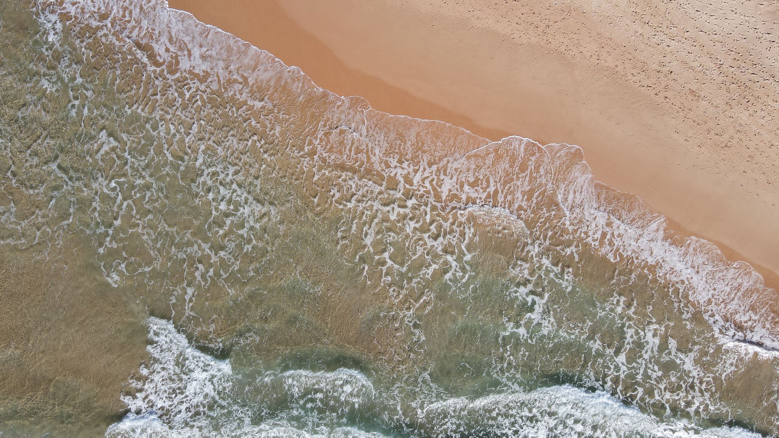 Download wallpaper 2560x1440 sea, aerial view, coast, beach widescreen