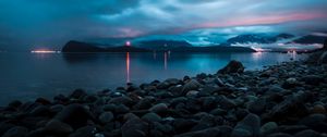 Preview wallpaper sea, bay, pebbles, stones, lights