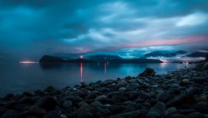 Preview wallpaper sea, bay, pebbles, stones, lights