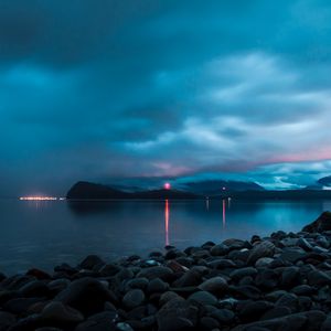 Preview wallpaper sea, bay, pebbles, stones, lights