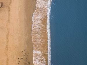 Preview wallpaper sea, beach, aerial view, wave, surf, sand