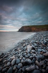 Preview wallpaper sea, beach, cliff, pebble, landscape