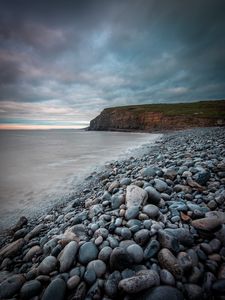 Preview wallpaper sea, beach, cliff, pebble, landscape