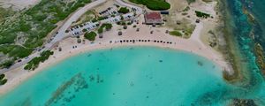 Preview wallpaper sea, beach, coast, tropics, road, cars, top view