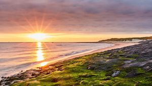 Preview wallpaper sea, beach, coast, rays, sun