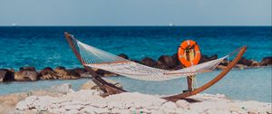 Preview wallpaper sea, beach, hammock, stones, summer, holiday