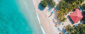 Preview wallpaper sea, beach, palm trees, umbrellas, summer, aerial view