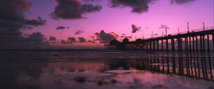 Preview wallpaper sea, beach, pier, dusk, clouds