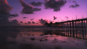 Preview wallpaper sea, beach, pier, dusk, clouds