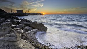 Preview wallpaper sea, beach, rocks, sunset