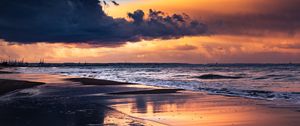 Preview wallpaper sea, beach, sunset, dusk, water, reflection