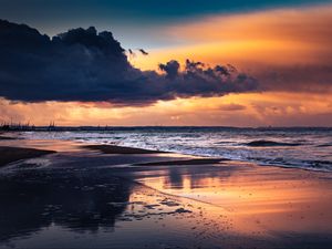 Preview wallpaper sea, beach, sunset, dusk, water, reflection