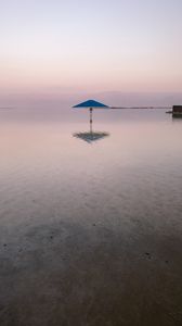 Preview wallpaper sea, beach, umbrella, water, reflection