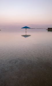 Preview wallpaper sea, beach, umbrella, water, reflection