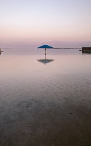 Preview wallpaper sea, beach, umbrella, water, reflection