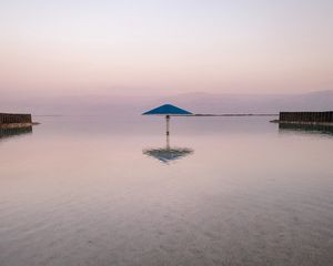 Preview wallpaper sea, beach, umbrella, water, reflection