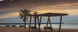 Preview wallpaper sea, benches, palms, rest, evening, clouds, starry sky