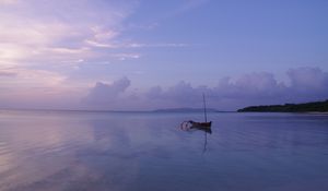 Preview wallpaper sea, boat, lonely, horizon, sunset