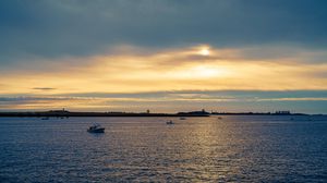 Preview wallpaper sea, boat, sky, clouds