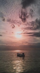 Preview wallpaper sea, boat, sunset, dusk, evening
