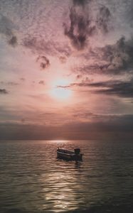 Preview wallpaper sea, boat, sunset, dusk, evening