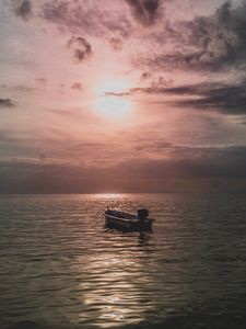 Preview wallpaper sea, boat, sunset, dusk, evening