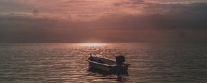 Preview wallpaper sea, boat, sunset, dusk, evening